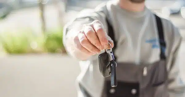 Shallow Focus Car Key held by a Man